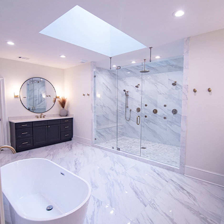 Egypt is the host of Married to Real Estate. She also used skylights and Sun Tunnels in her personal home renovation. Photography of the main bathroom and walk-in closet